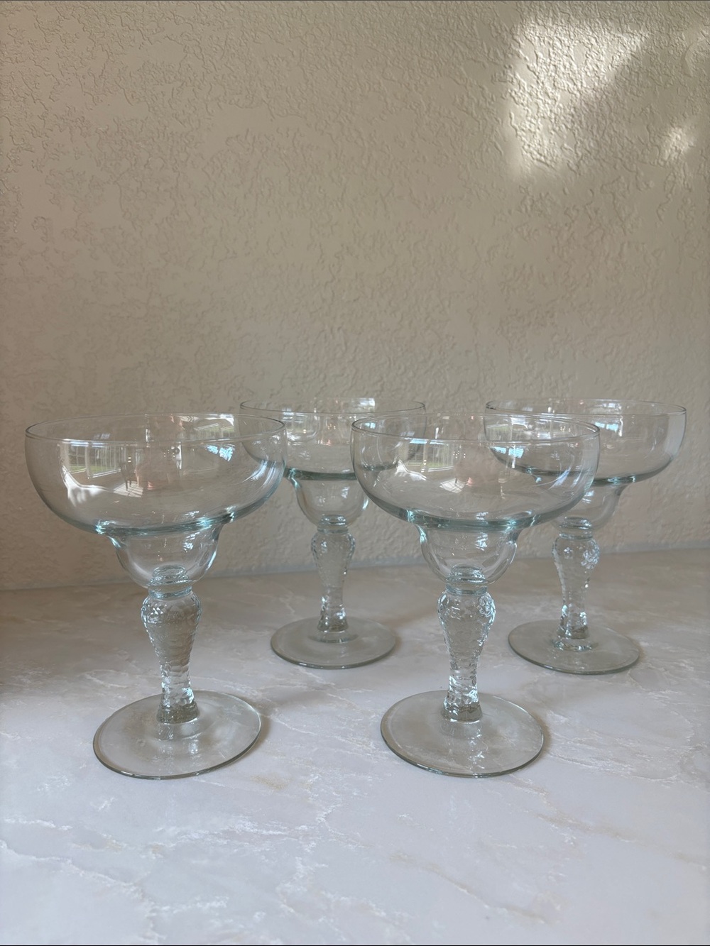 Set of 4 Clear Textured Stem Coupe Glasses